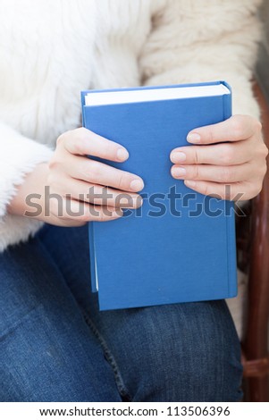 Woman holding a book