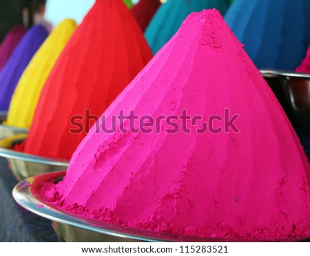 Piles and mounds of colorful dye powders for holy festival & other religious purposes being sold in indian market. These dry powders are in great demand in India and used for rangoli, holi, etc