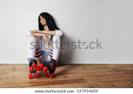 young girl in roller skates