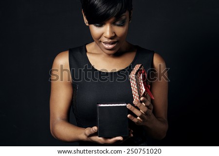 black woman wondering of a present