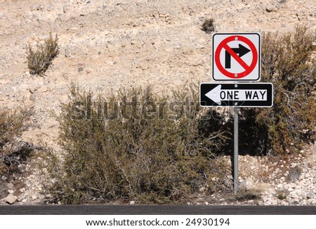 No Right Turn and One Way Sign in the Desert