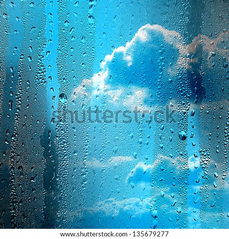 clouds through the window in the rain