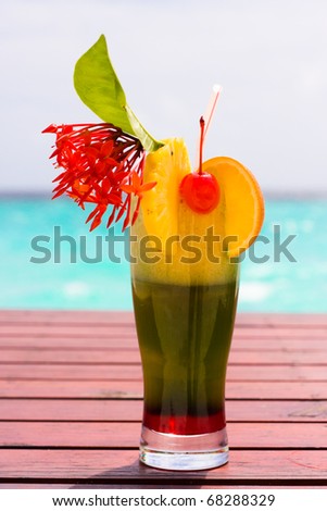 Cocktail on a table at shore of ocean