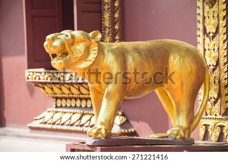 golden tiger statue the symbol of person who was born in the year of tiger
