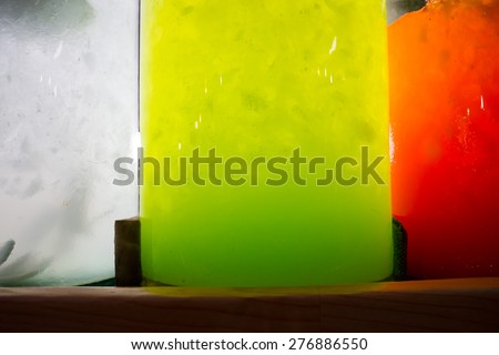 the colorful of the juice bottle under the light