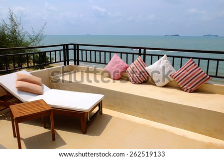 Sea view balcony with  day bed and cushions