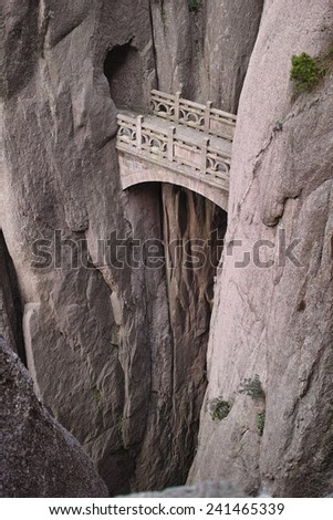 Huangshan. Stone bridge in the mountains of China.
