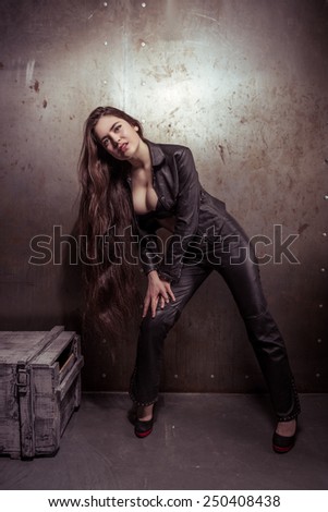Girl in leather pants and jacket