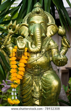 The Indian God Ganesha made from clay in low relief carving jig saw image style.