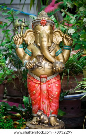 The Indian God Ganesha made from clay in low relief carving jig saw image style.