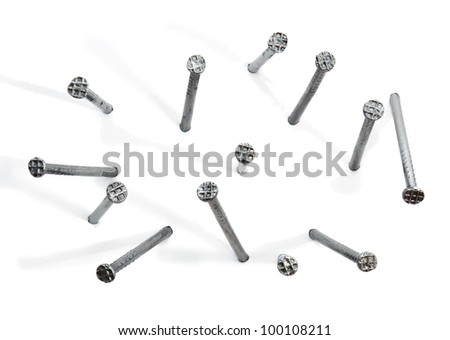 Metal nails with shadow on white background Metal nails with shadow on white background