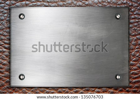 High Detailed Metal Plate Sign With Screws On Leather Surface