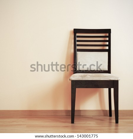 Chair in the corner of room