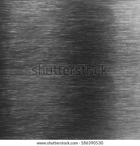 Dark black shiny brushed aluminum metal surface