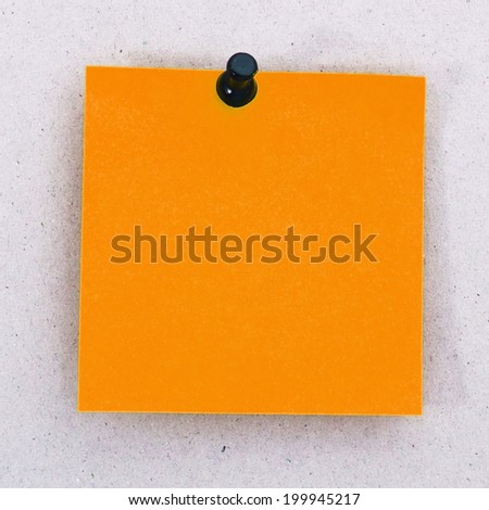 Orange reminder note list with clip