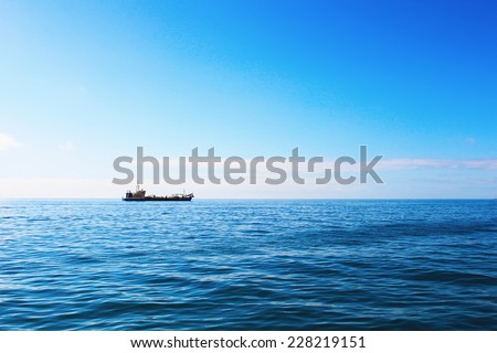 Cargo ship in ocean
