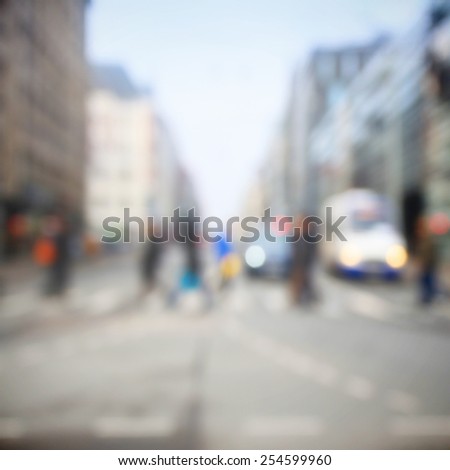 Pedestrian in city street road, blurred unrecognizable people crowd
