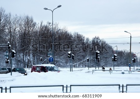 Crossroads with traffic lights in the winter