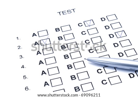 stock photo : One test with different answers and one pen