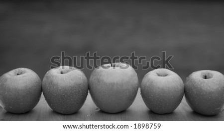 black and white photo of apples