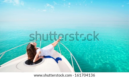 Woman Lying On A Private Yacht In The Sea