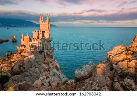 Beautiful old castle on the cliff by the sea