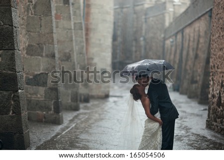 Wedding Kiss In The Rain