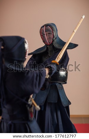 duel of two kendo fighters. Japanese martial art of sword fighting