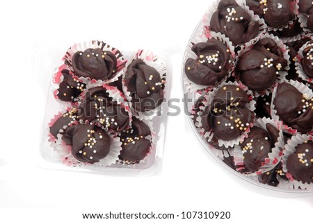 chocolate cookies in the two types of packaging  isolated on white background