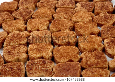 pattern of pastries with red sugar sprinkles
