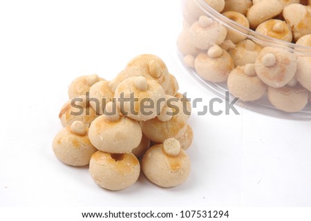 pastries with a wash of egg yolks and nuts isolated on white background
