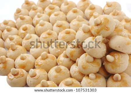 pattern of pastries with a wash of egg yolks and nuts