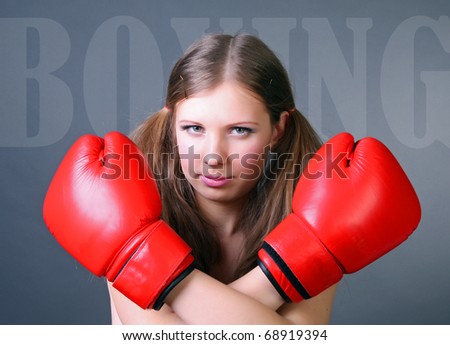 Women boxing  red gloves.