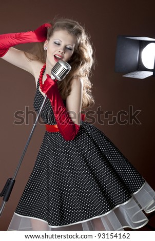 Pin-up girl and vintage microphone