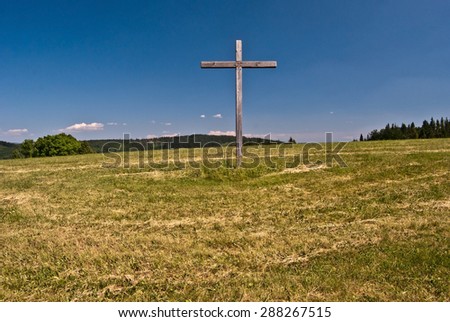wooden cross on Loucka hill in Slezske Beskydy mountains