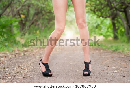 female legs in high heels close up