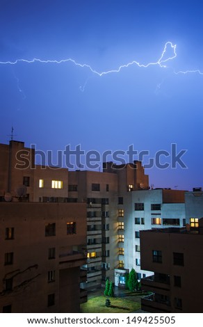 Lightning in the sky above the dwelling house