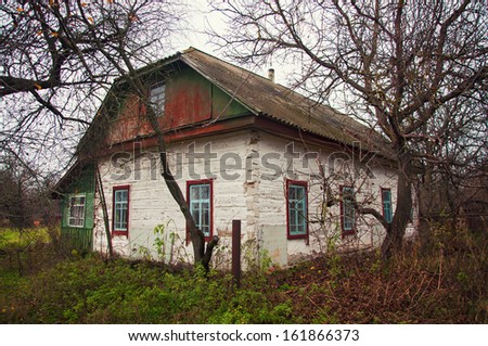 old white wooden house in the village