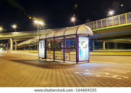 bus stop near the bridge at night in Warsaw