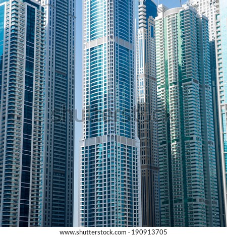 DUBAI, UAE - 7 MARCH, 2014: Modern skyscrapers in Dubai Marina, close up, in Dubai, UAE. Here is the tallest residential building in the world. March 7, 2014 Dubai, UAE.