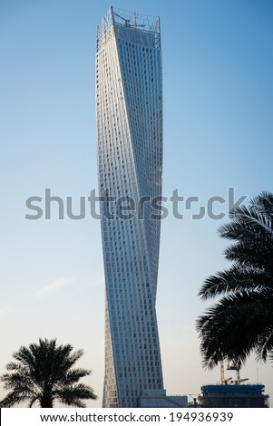 DUBAI, UAE - 3 MARCH, 2014: Twisted modern building in Dubai Marina. Elite residential area in Dubai. March  3, 2014 Dubai, UAE.