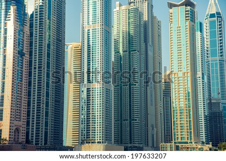 DUBAI, UAE - 7 MARCH, 2014: Modern skyscrapers in Dubai Marina, close up, in Dubai, UAE. Here is the tallest residential building in the world. March 7, 2014 Dubai, UAE.