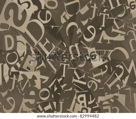 black and white background with letters cut from newspaper