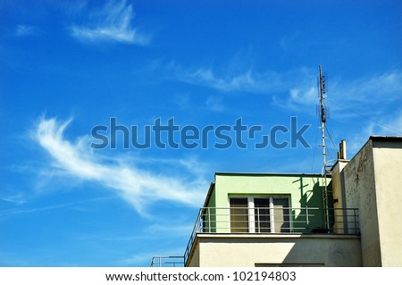 Urban house, sky background, real estate