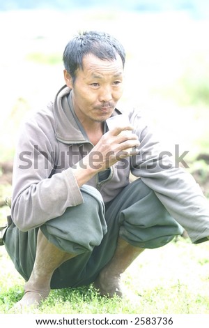 Sherpa Man Crouching