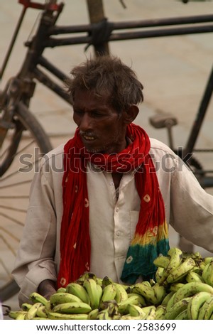 Nepali Man at Fruit Stand