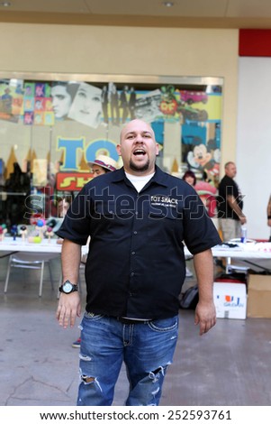 LAS VEGAS -OCT 10: Johnny Jimenez speaks to a crowd . The Toy Shack, on October 10, 2014. Johnny Jimenez is also a toy appraiser on the reality TV show Pawn Stars.