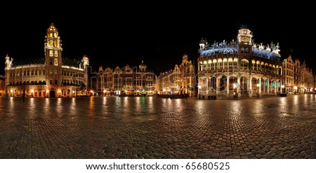 Night panorama of Grande Place, Grote Markt(Town Hall ) Brussels, Belgium, Europe(Main Square). Rainy night, wet cobble stones.