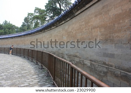 Lone tourist at Sound Reflecting Wall, Temple of Heaven, China