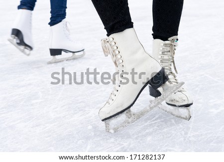 Feet in skates on ice